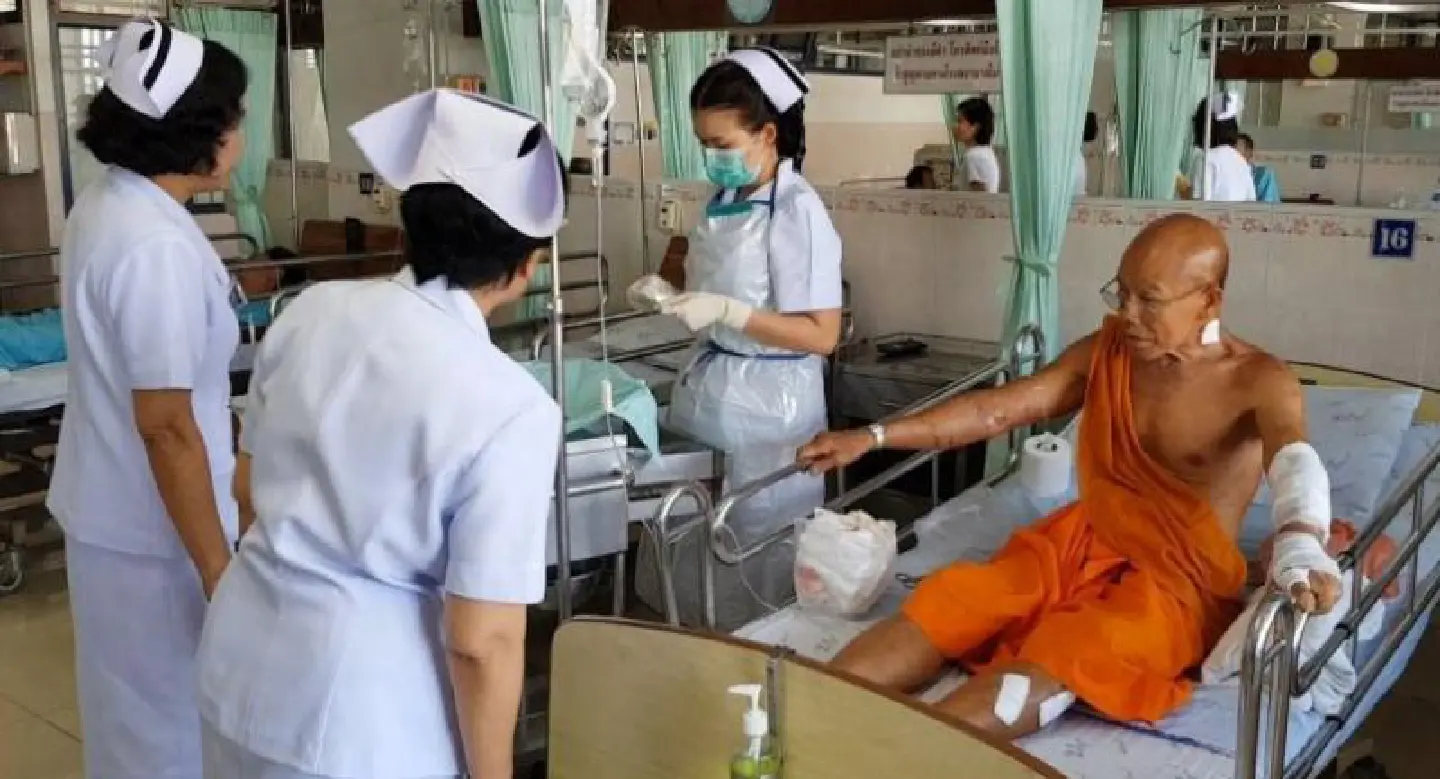 Monk survives pit bull onslaught Monk survives pit bull onslaught