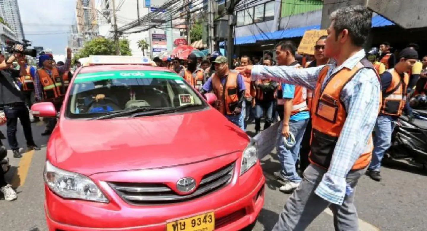 Angry motorcycle taxi drivers in Grab protest