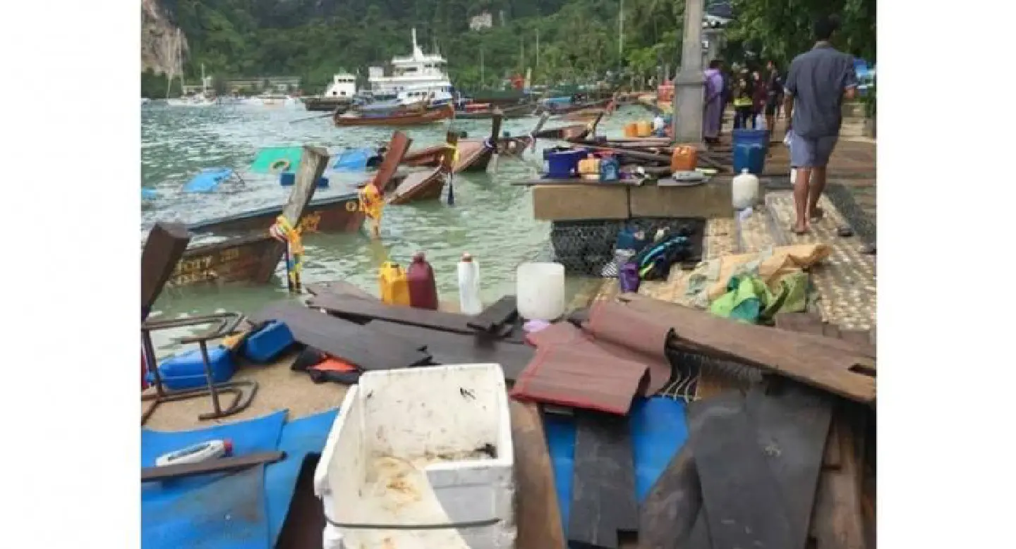 Two-metre waves hammer longtail boats on Koh Phi Phi Two-metre waves hammer longtail boats on Koh Phi Phi