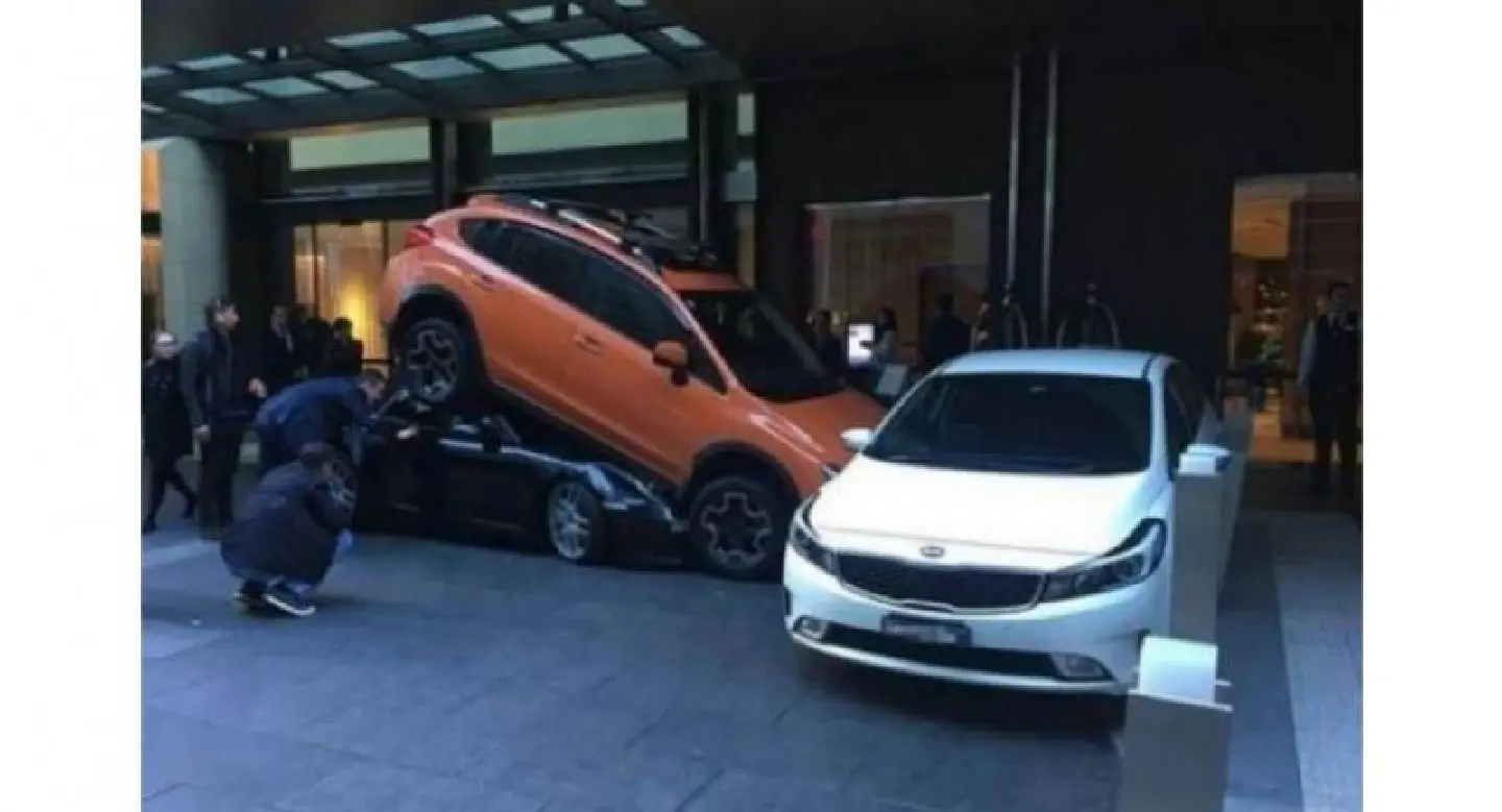 How not to park a Porsche: Sydney hotel valet's attempt goes horribly wrong