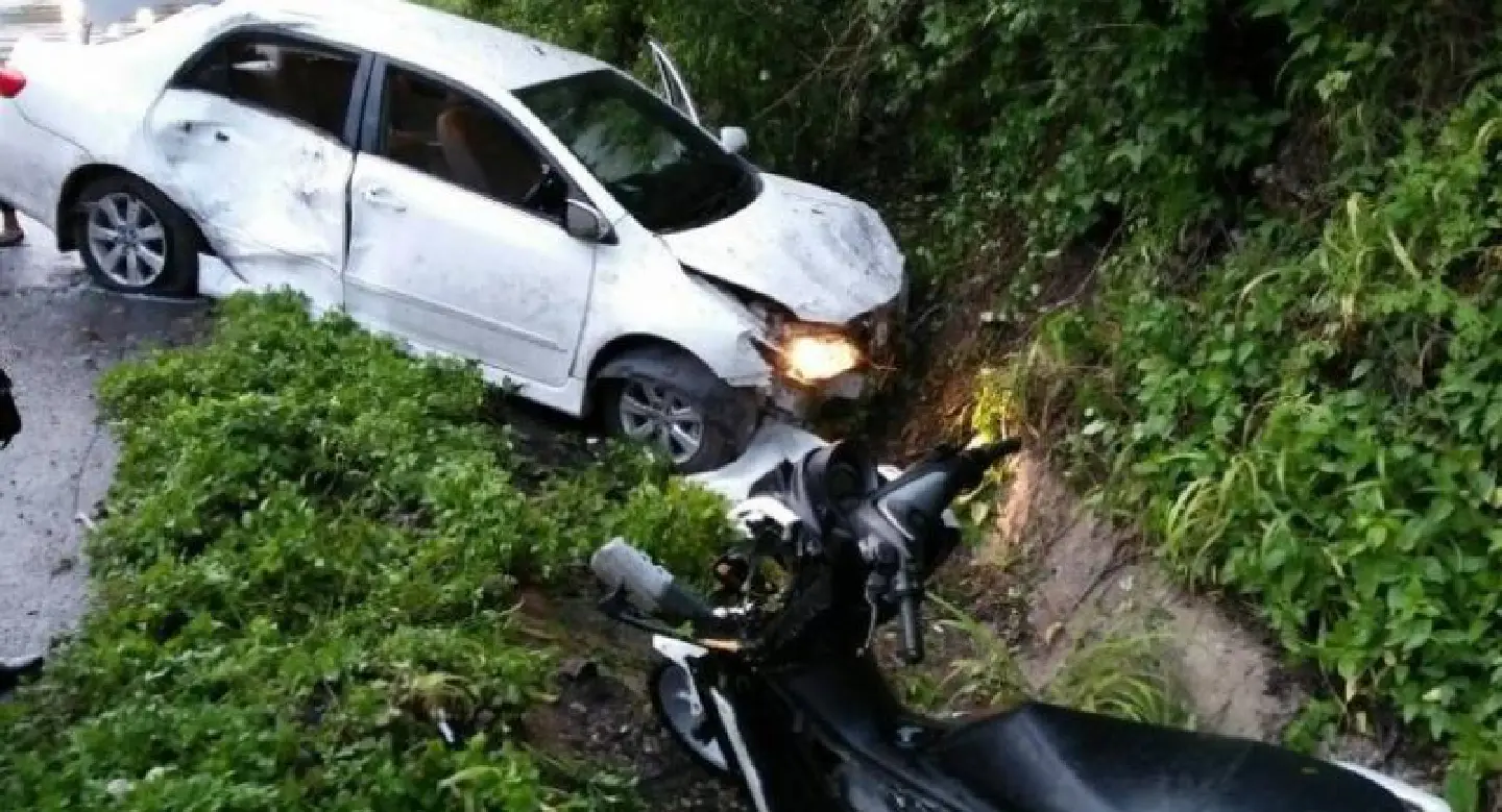 Two tourists killed after sedan crashes into their bike Two tourists killed after sedan crashes into their bike