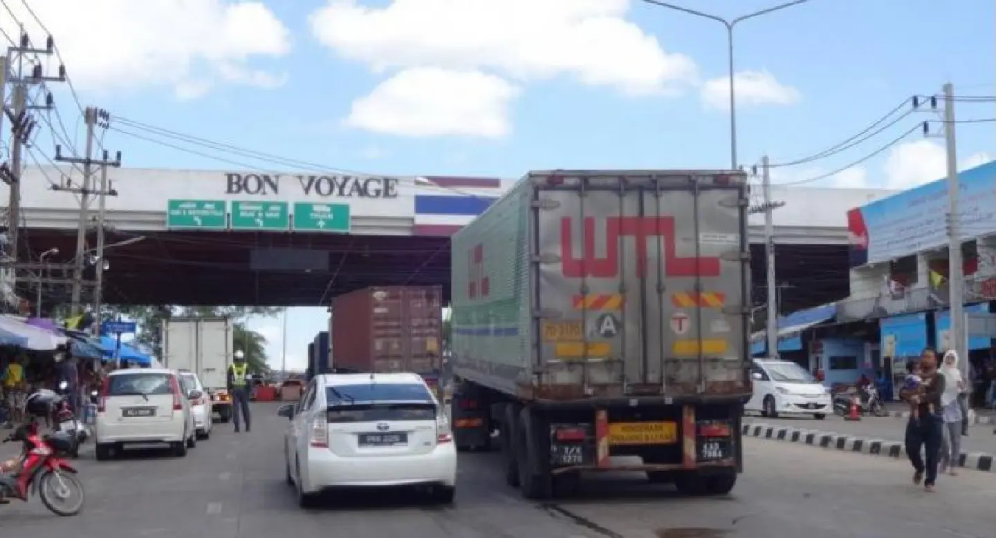 Change in Malaysian govt puts hold on trial 24-hour border plan