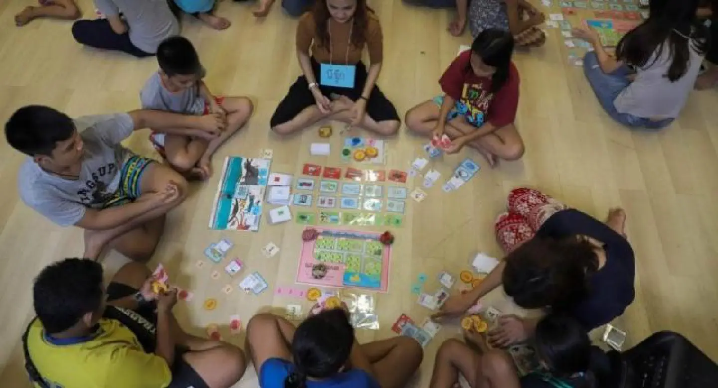 Board game teaches financial literacy to Klong Toei slum teens Board game teaches financial literacy to Klong Toei slum teens