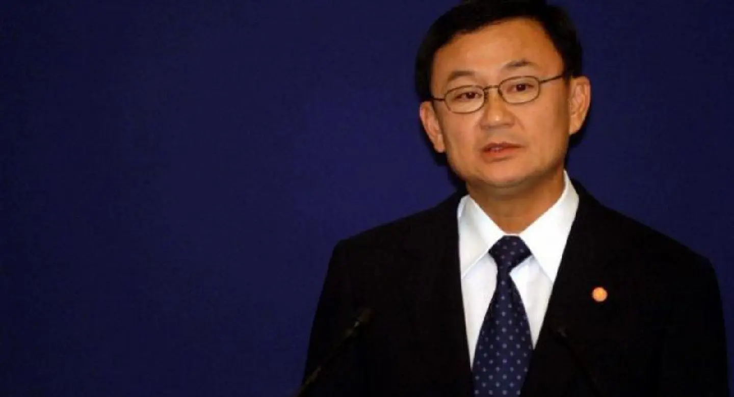Fleeing Thaksin hit with second arrest warrant Fleeing Thaksin hit with second arrest warrant