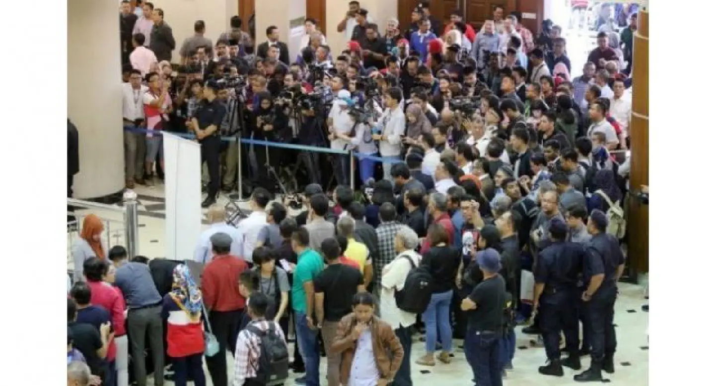 Several journalists hurt in scuffle during Najib's trial Several journalists hurt in scuffle during Najib's trial
