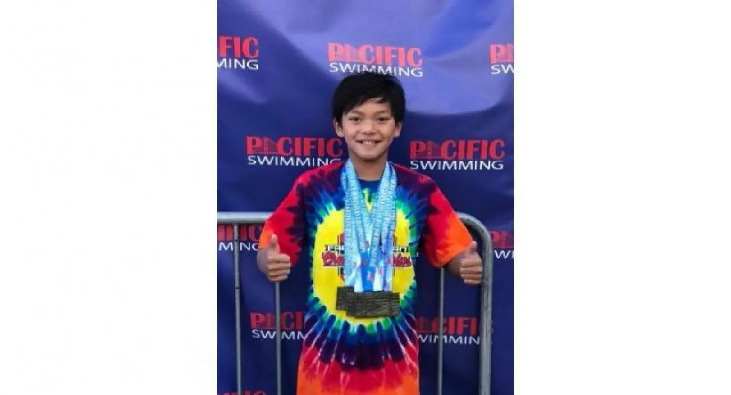 10-year-old Fil-Am Clark Kent breaks Michael Phelps' swim record