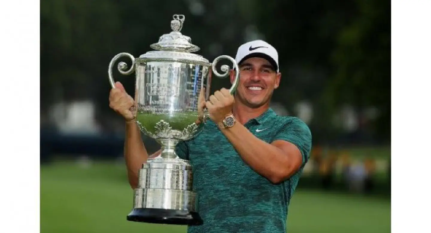 Koepka holds off Woods to win 100th PGA Championship Koepka holds off Woods to win 100th PGA Championship
