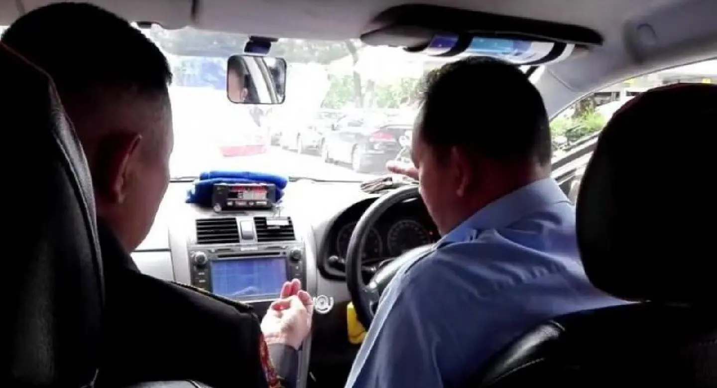 Taxi driver fined for watching erotic video, improper dress while driving passenger Taxi driver fined for watching erotic video, improper dress while driving passenger