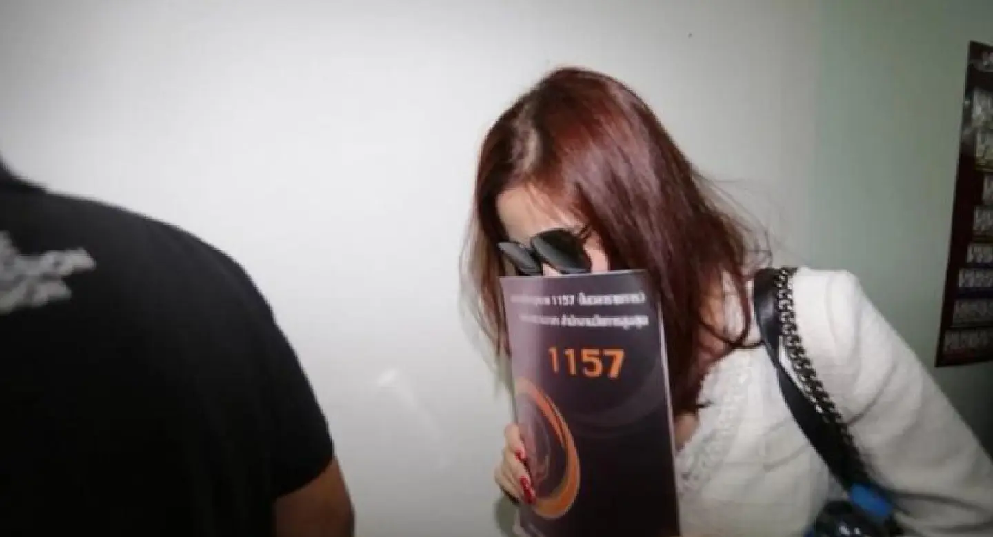 Uracha, mother and brother silent as they appear in money-laundering case Uracha, mother and brother silent as they appear in money-laundering case