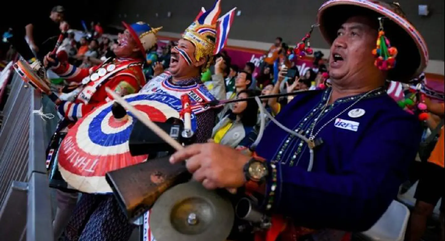 Thai superfan bangs the drum at Asian Games Thai superfan bangs the drum at Asian Games