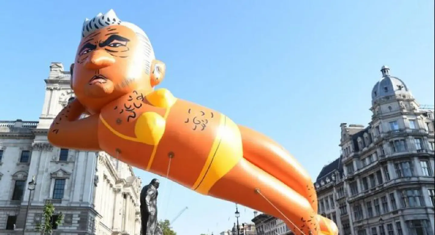 Balloon of mayor Khan in bikini flies over London