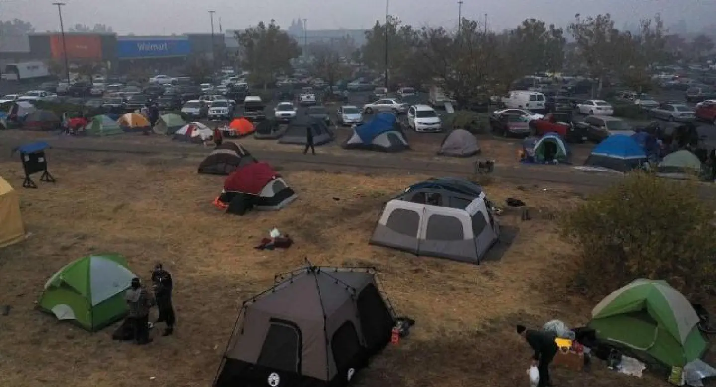 Trump to visit as more than 1,000 missing in California fire