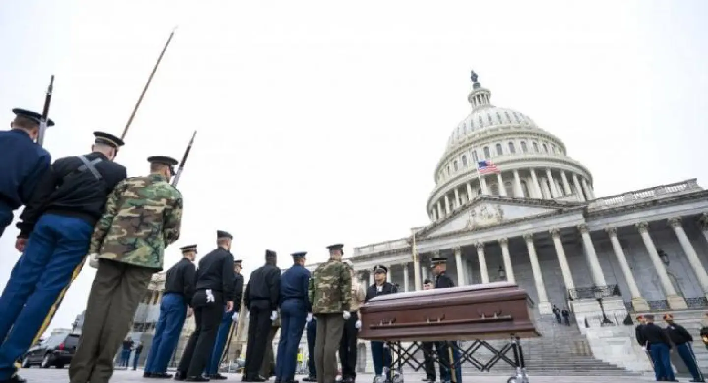Air Force One collects Bush casket for days-long homage