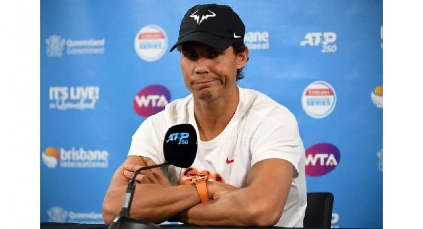 Thigh strain forces Nadal out of Brisbane tournament Thigh strain forces Nadal out of Brisbane tournament