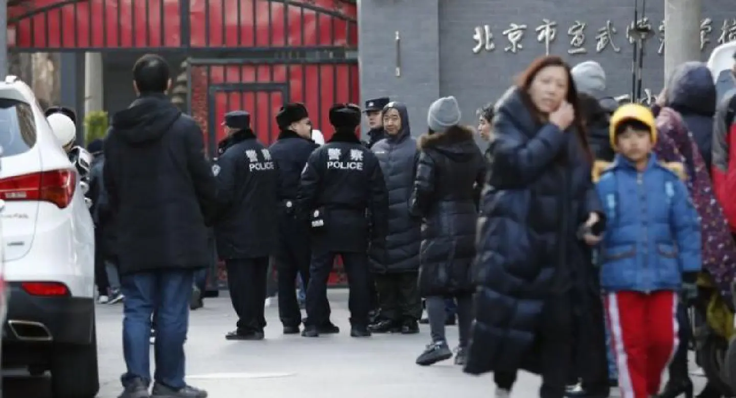 Attacker hurts 20 children with hammer at Beijing school