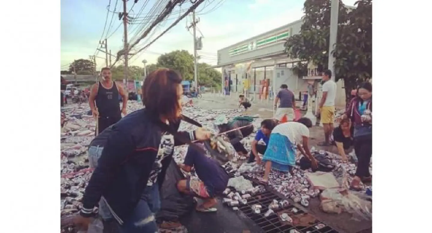 Four arrested for making off with beer cans from truck accident scene Four arrested for making off with beer cans from truck accident scene