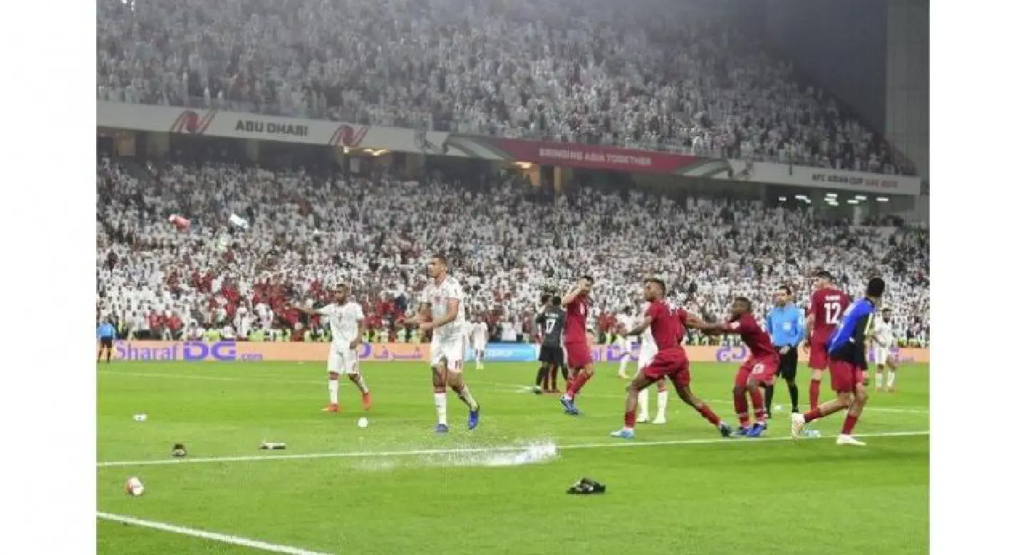 Qatar pelted with shoes as they stomp UAE to reach Asian final Qatar pelted with shoes as they stomp UAE to reach Asian final