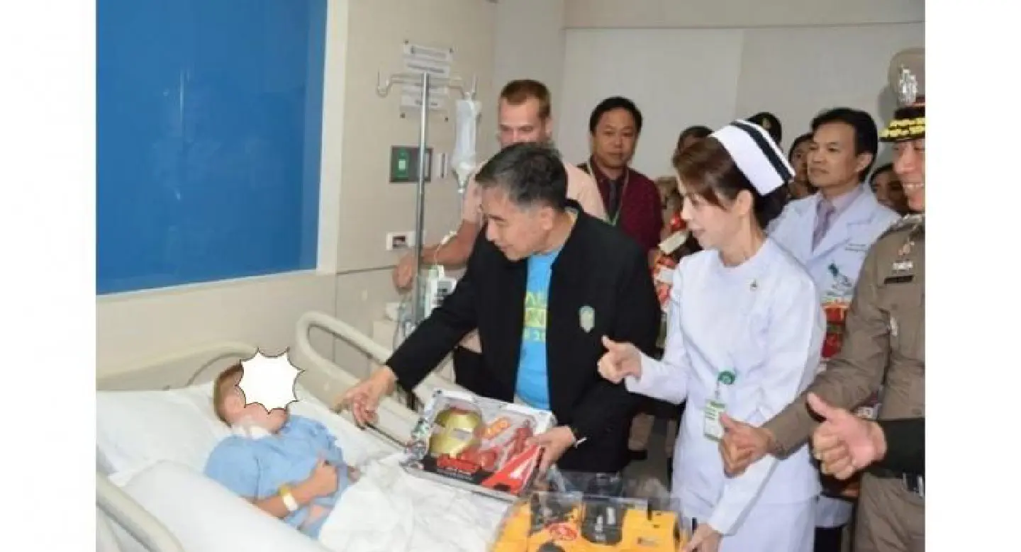 Boy savaged by dogs recovering in hospital