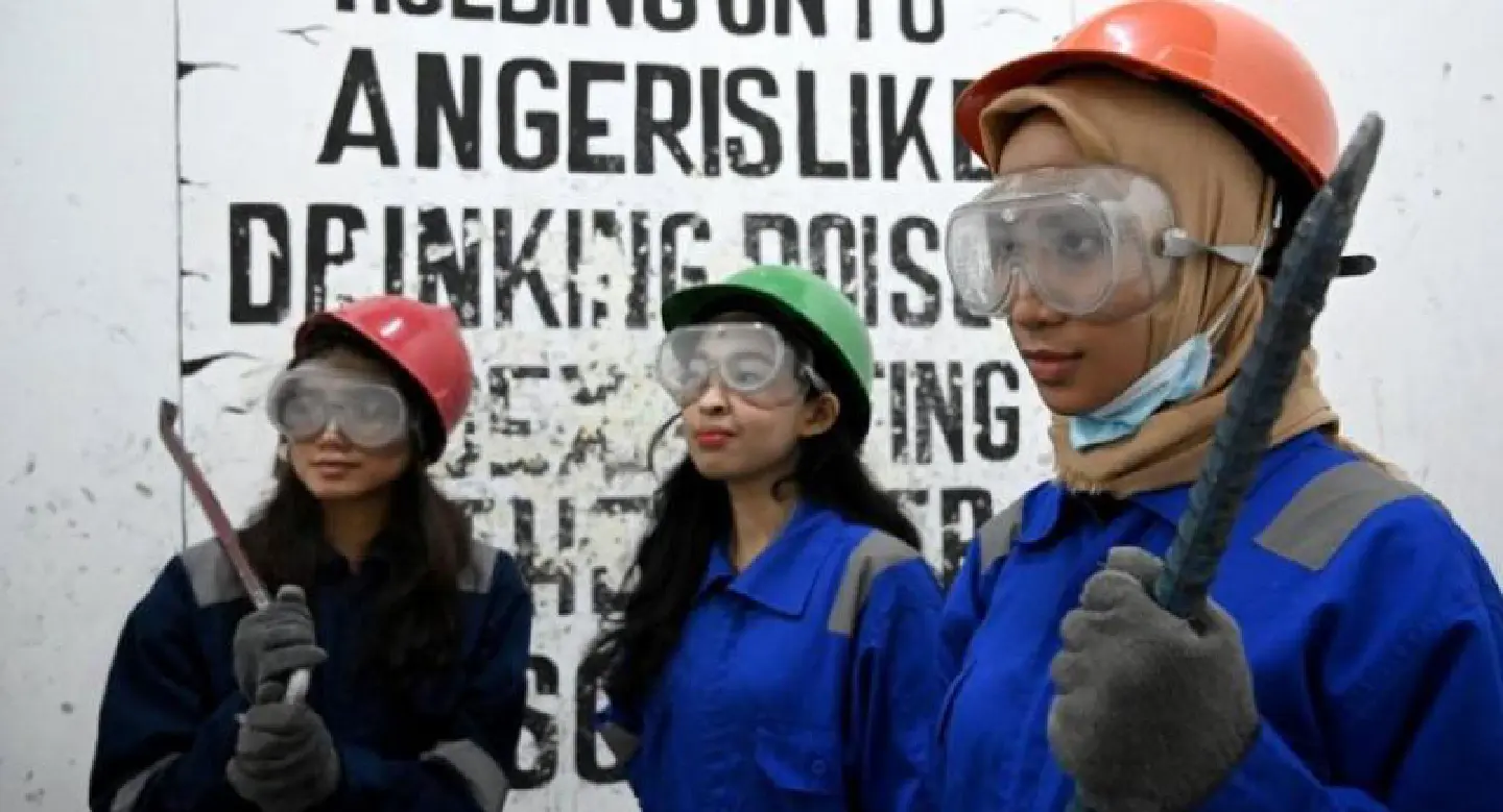 Raging bull: smashing away anger at Indonesia's 'Temper Clinic' Raging bull: smashing away anger at Indonesia's 'Temper Clinic'