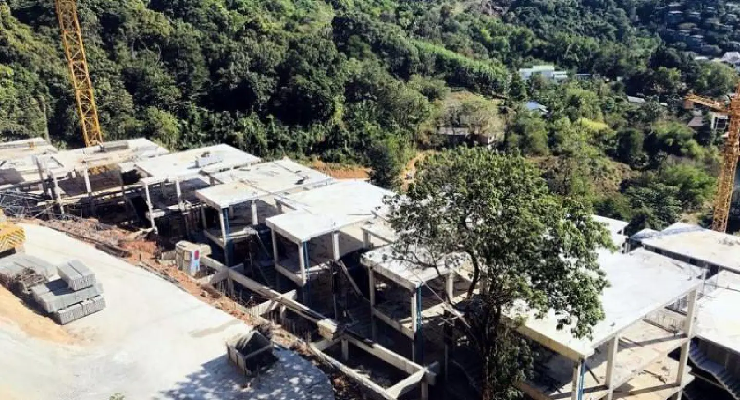 Construction of luxury condo block in Kata continues amid land dispute