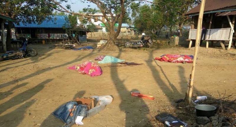 Bodies of policemen, killed a millant sttack, are covered at the Yotayoke police station, near Sittwe in Rakhine State on March 10, 2019. Photo/AFP