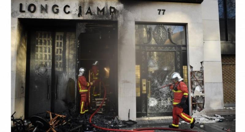 Paris luxury stores looted, burned in 'yellow vest' riots