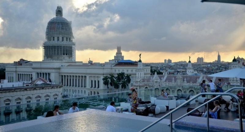 The swimming pool on the rooftop of the Gran Manzana Hotel in Havana is a tourist magnet.  
