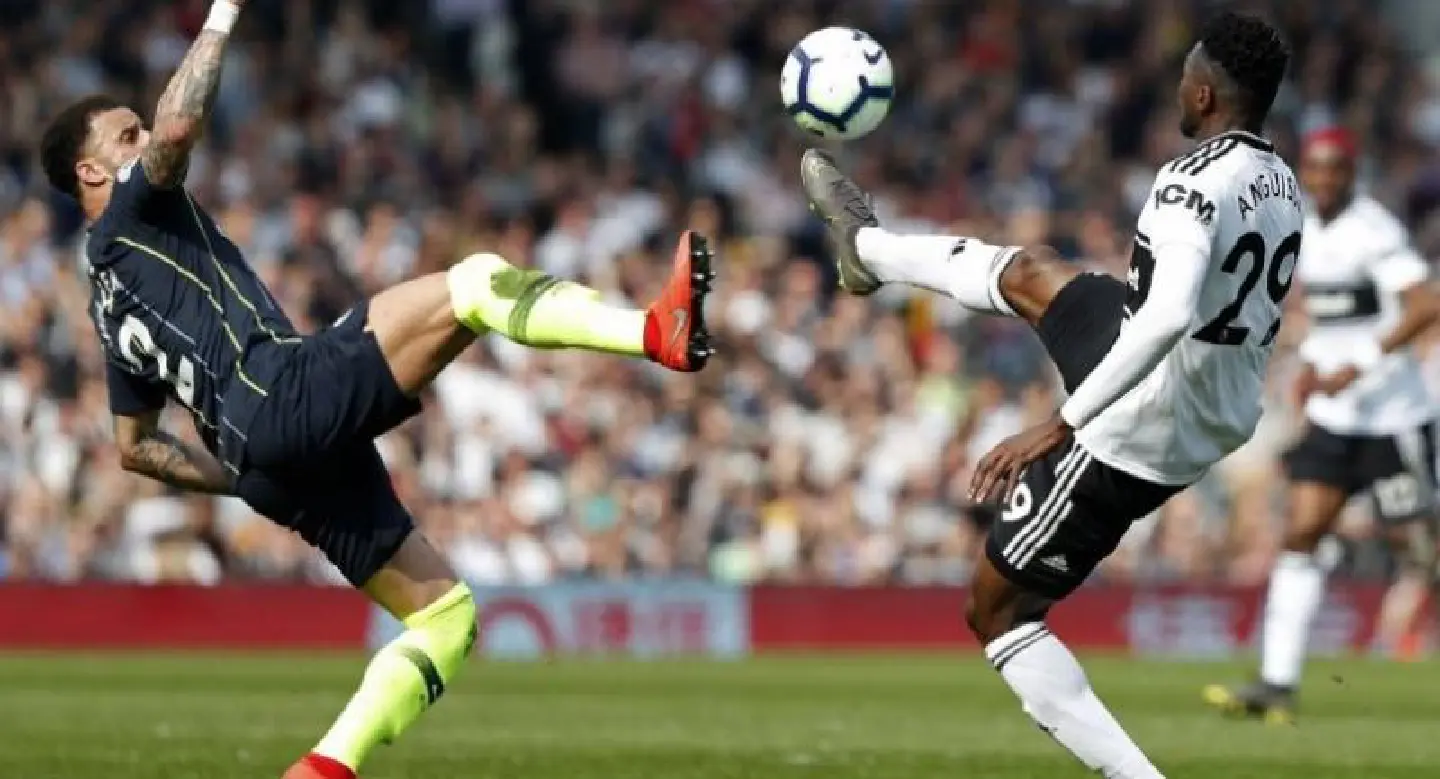 Man City cruise back top of Premier League with win at Fulham