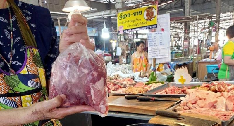 Feast all you like at Songkran but take care with the pork you eat, warn health experts