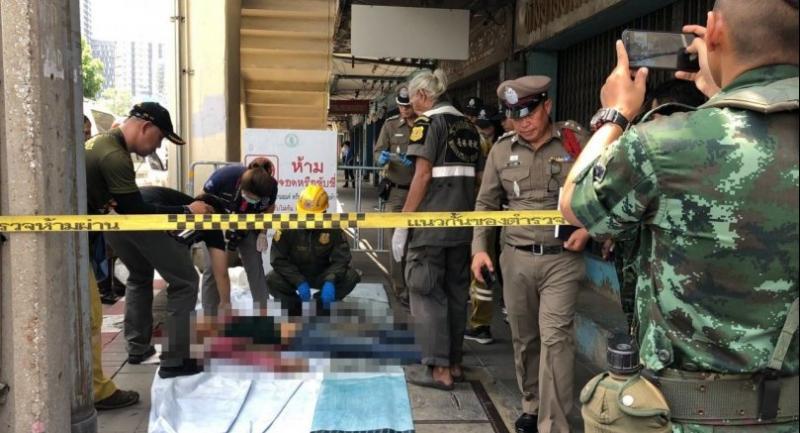 Bangkok worker electrocuted while changing sign