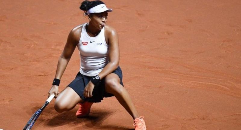 Japan's Naomi Osaka reacts after a point against Taiwan's Su-Wei Hsieh. / AFP