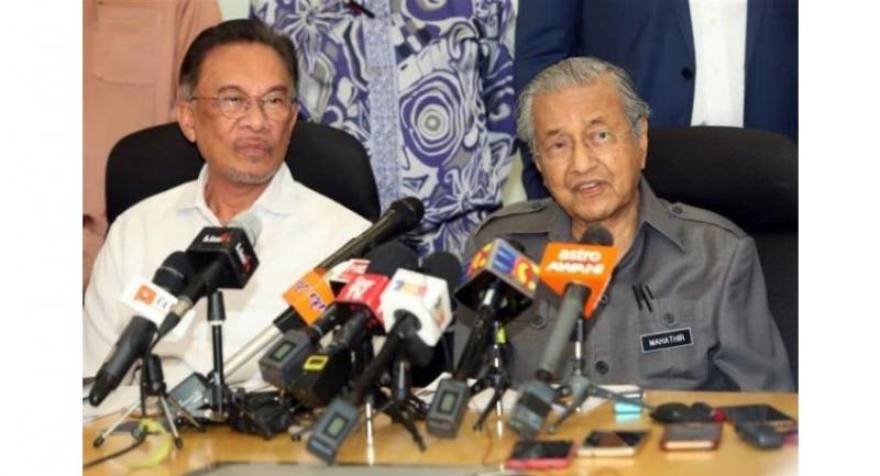 Dr M hints at three-year maximum stay as Malaysian PM