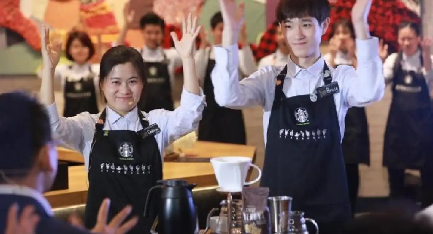Starbucks opens first store with sign language capability in China