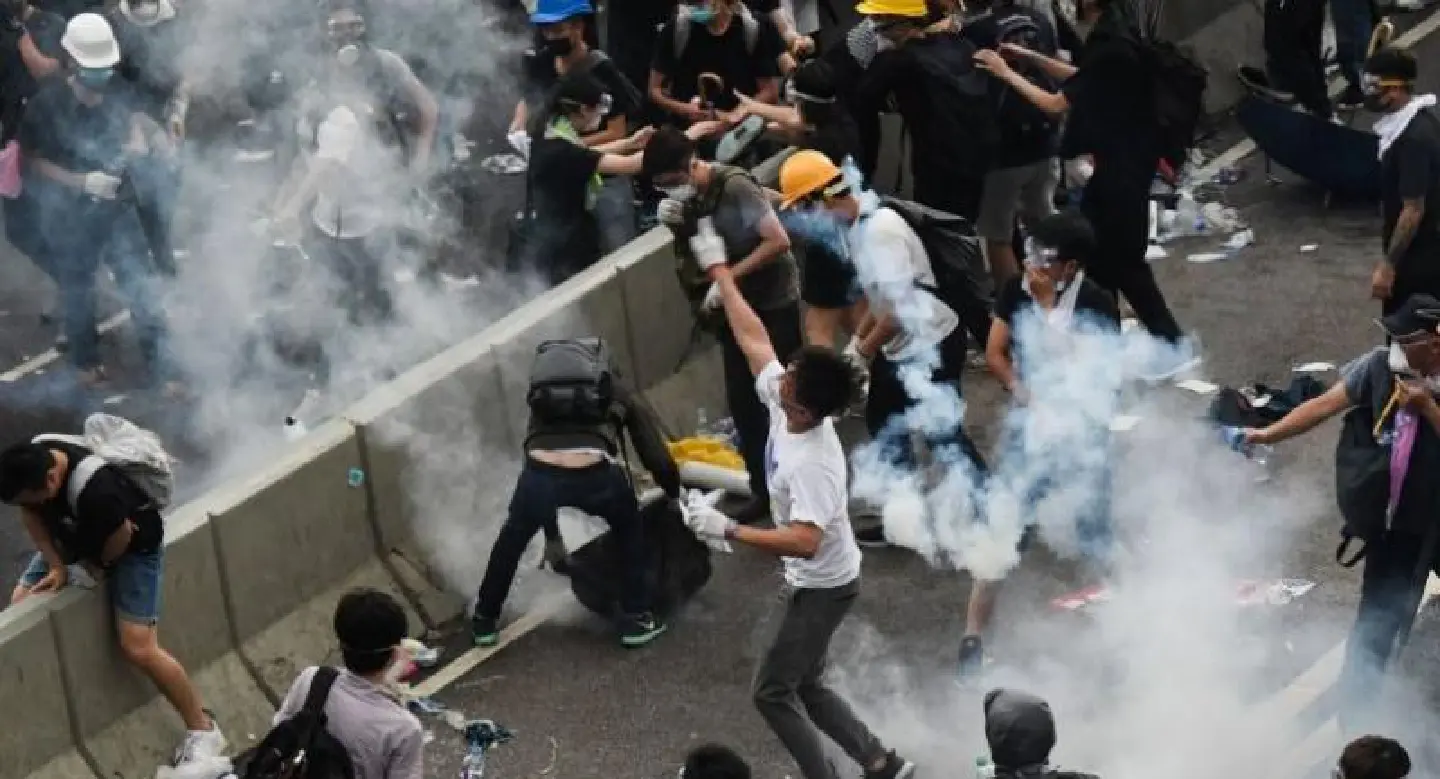 Hong Kong police use tear gas as protesters try to storm parliament Hong Kong police use tear gas as protesters try to storm parliament