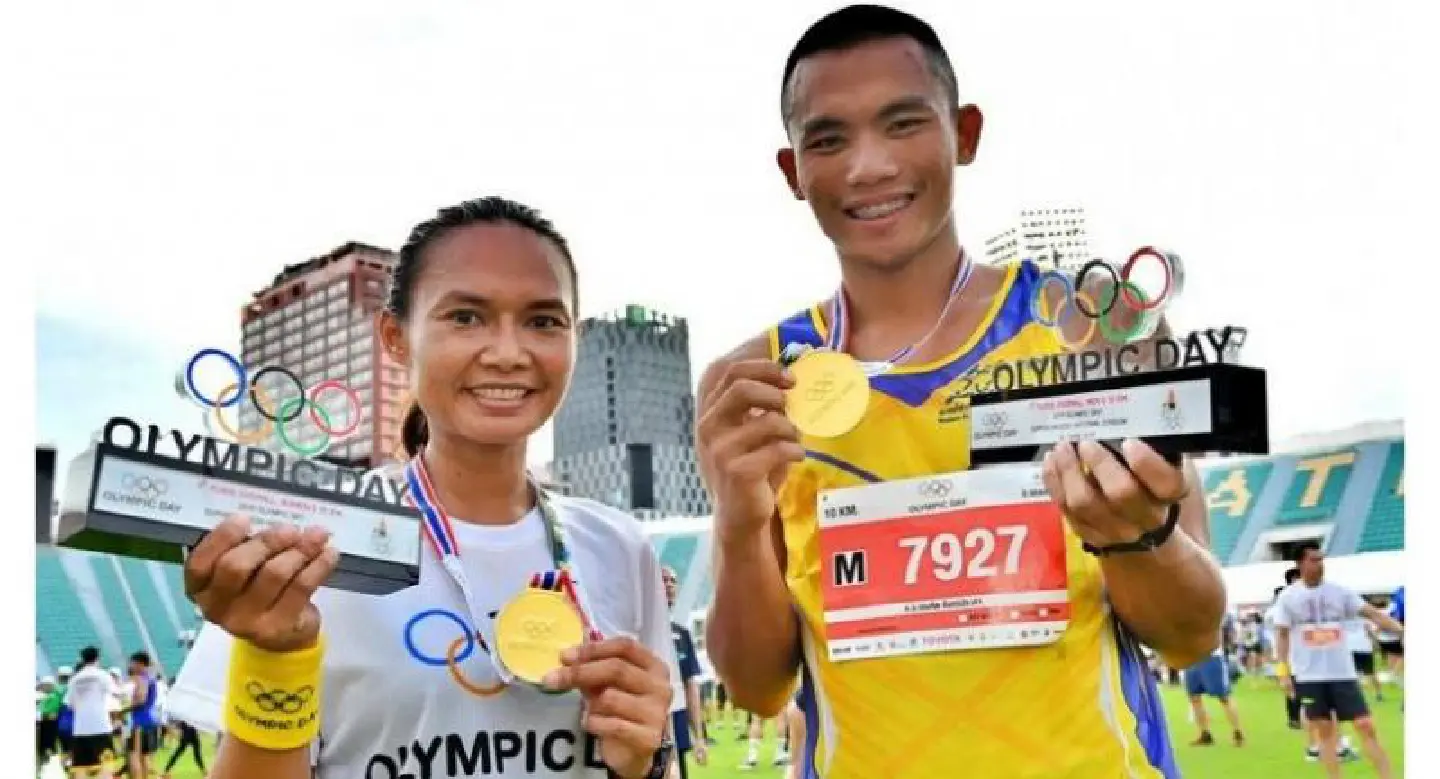 Gold medal winners shine on Olympic Day