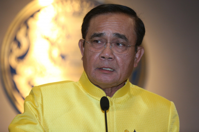 PM Prayut doubles as Defence Minister in new Cabinet PM Prayut doubles as Defence Minister in new Cabinet