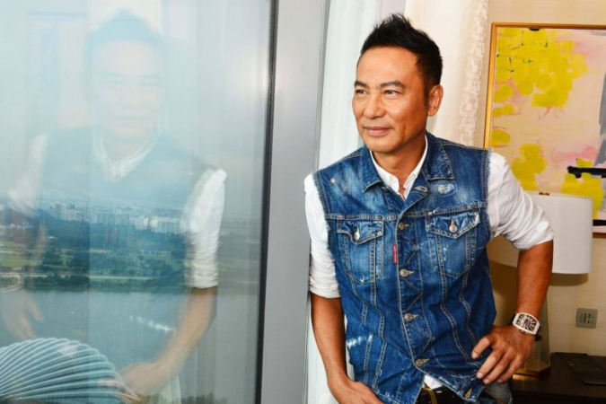 Simon Yam, 64, hopes that help can be extended to the man who surprised him on stage at a promotional event in Zhongshan in Guangdong province./photo by Lianhe Zaobao 