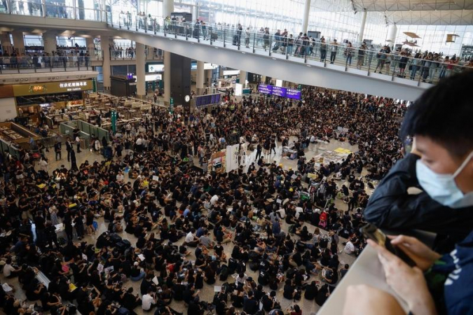 ANN: Thousands of protesters flood Hong Kong airport in latest protest campaign ANN: Thousands of protesters flood Hong Kong airport in latest protest campaign