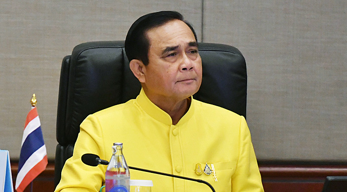 Prayut enters Defence Ministry as minister Prayut enters Defence Ministry as minister