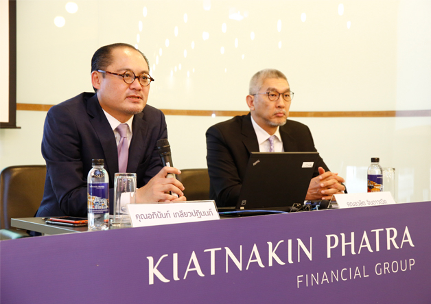 Aphinant Klewpatinond, left, chief executive officer of Kiatnakin Phatra Financial Group
