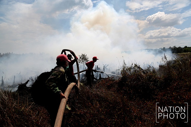 Khuan Khreng wildfire still smouldering as officials tackle smoke Khuan Khreng wildfire still smouldering as officials tackle smoke