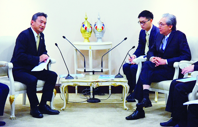 Nakano, left, and Somkid.