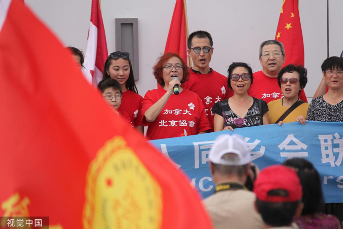 Overseas Chinese communities in the Greater Toronto Area hold a peaceful rally calling for an end to the violence that has gripped China's Hong Kong Special Administrative Region in recent weeks, Aug 11, 2019. [Photo/VCG]