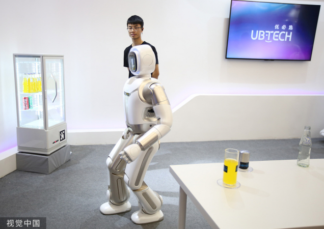 A humanoid robot called Walker, developed by Ubtech, is displayed at the World Robot Conference in Beijing on Tuesday. (Photo/VCG)