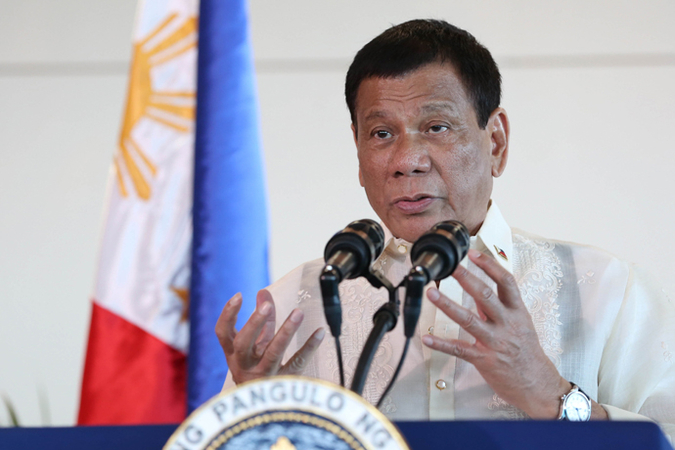 Duterte heads to China with tougher stance on disputed sea Duterte heads to China with tougher stance on disputed sea