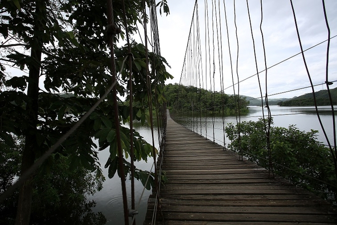 The suspended bridge at the Kaeng Krachan Dam where an oil drum was found containing the skeletal remains of “Billy” Rakchongcharoen.