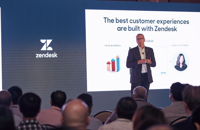 A Zendesk executive speaks at a company seminar.