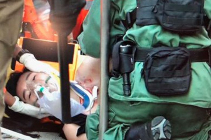 TV footage showed medical personnel attending to the man in Tai Ha Road. PHOTO: TWITTER