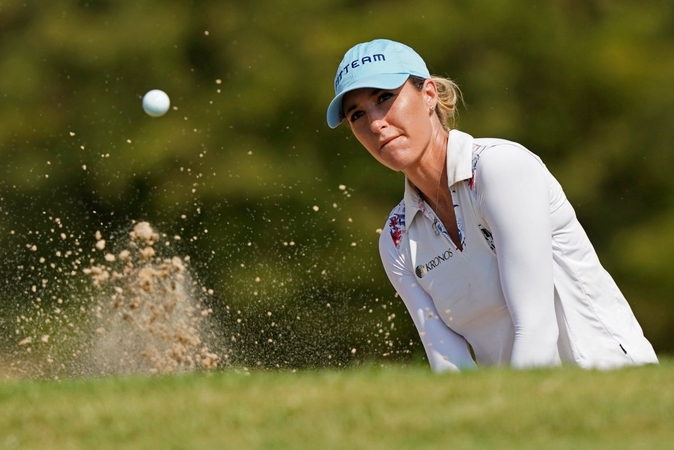 Jaye Marie Green hits from a sand trap on the ninth hole during the Second Round of the Volunteers of America Classic golf tournament at the Old American Golf Club on October 4, 2019 in The Colony, Texas. (Photo by Chuck Burton/Getty Images)