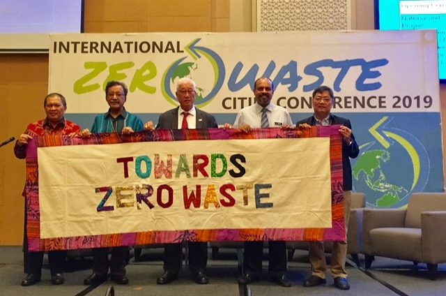 Representatives from Asian cities and NGOs commit to zero waste solutions.  VNS Photo Khánh Dương